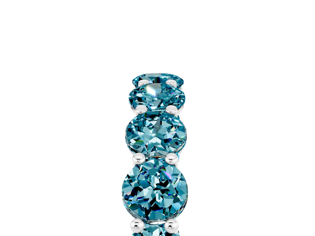 Shared Prong Round Blue Topaz Eternity Band in White gold with Continuous Circle