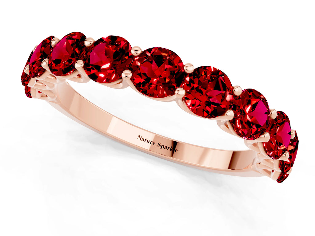 Shared Prong Round Ruby Eternity Band in Rose gold with Continuous Circle