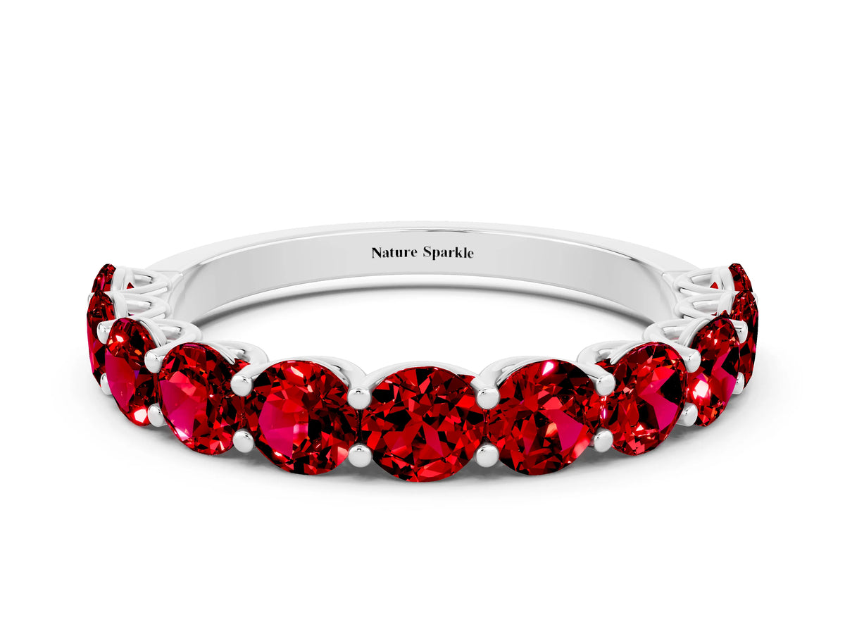 Shared Prong Round Ruby Eternity Band in Silver with Continuous Circle