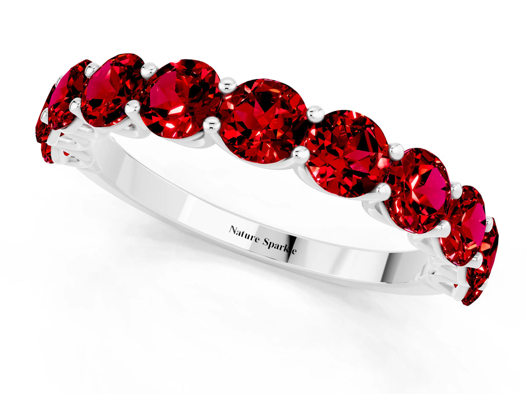 Shared Prong Round Ruby Eternity Band in Silver with Continuous Circle