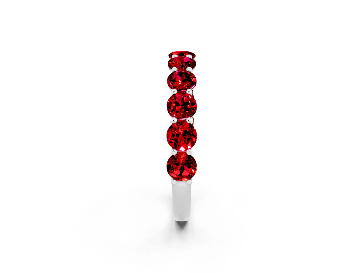 Shared Prong Round Ruby Eternity Band in Silver with Continuous Circle