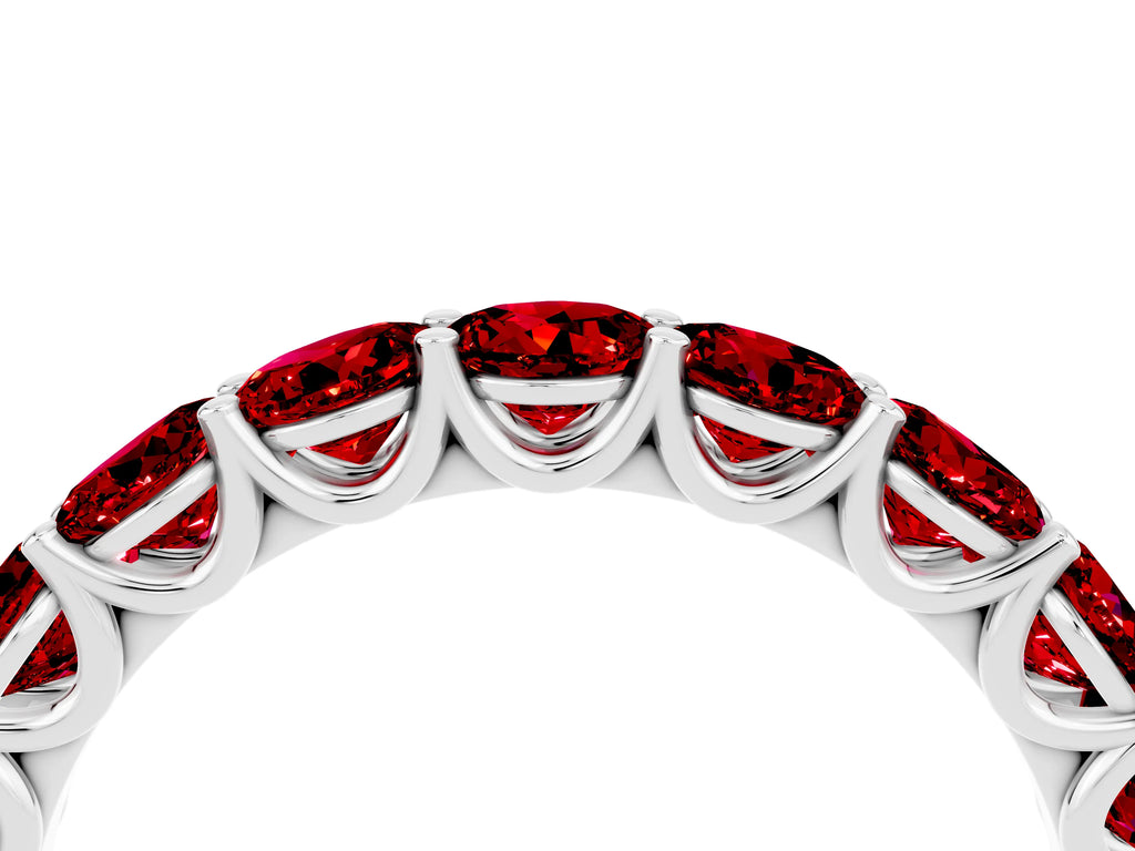 Shared Prong Round Ruby Eternity Band in Silver with Continuous Circle