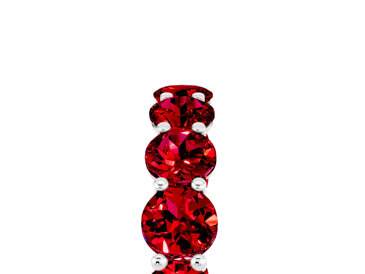 Shared Prong Round Ruby Eternity Band in Silver with Continuous Circle
