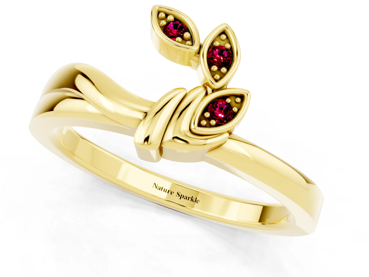 Three-Stone Round Garnet Leaf Bypass Ring in Yellow gold with Bezel Setting