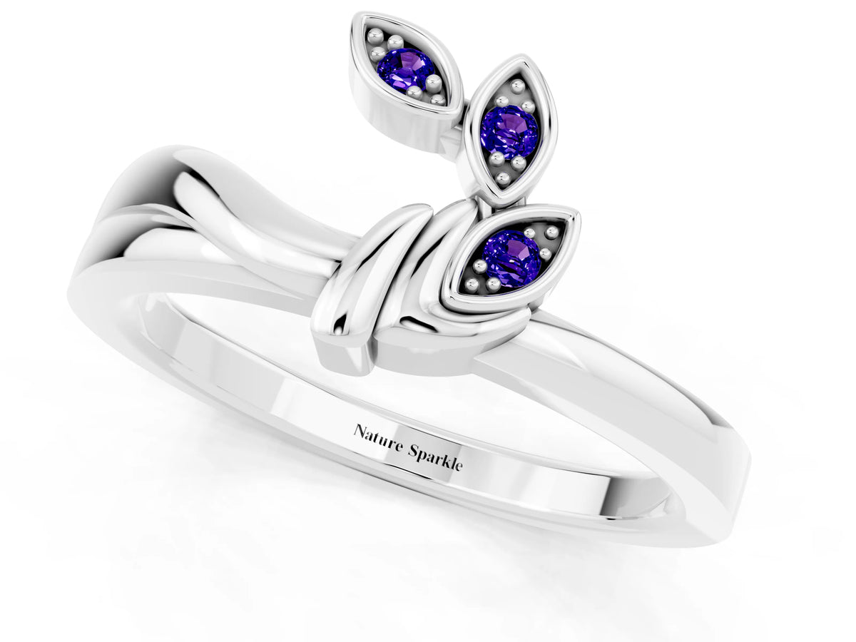 Three-Stone Round Tanzanite Leaf Bypass Ring in Silver with Bezel Setting