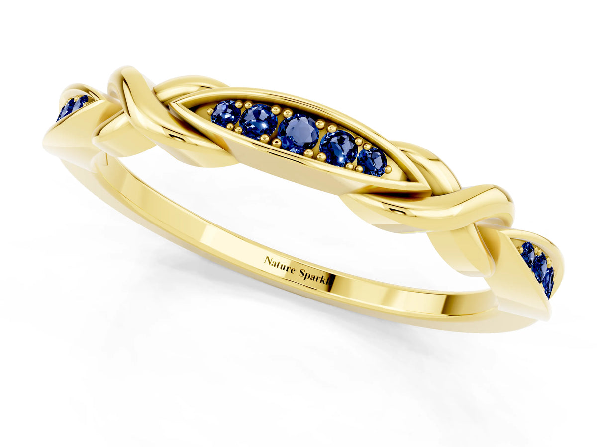 Twisted Marquise Blue Sapphire Pavé Band in Yellow gold with Shared Prong Setting