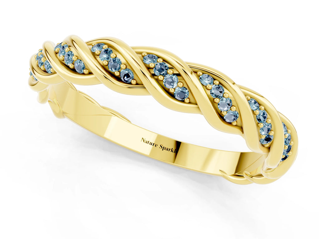 Twisted Pavé Round Aquamarine Eternity Band in Yellow gold with Shared Prong Setting
