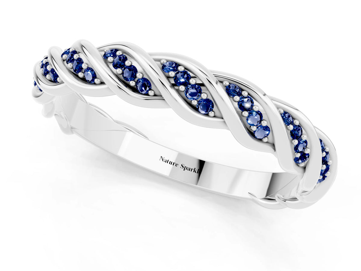 Twisted Pavé Round Blue Sapphire Eternity Band in Silver with Shared Prong Setting