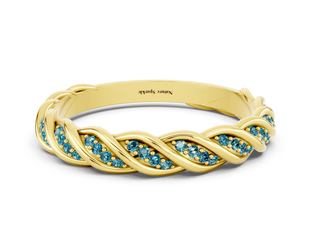 Twisted Pavé Round Blue Topaz Eternity Band in Yellow gold with Shared Prong Setting