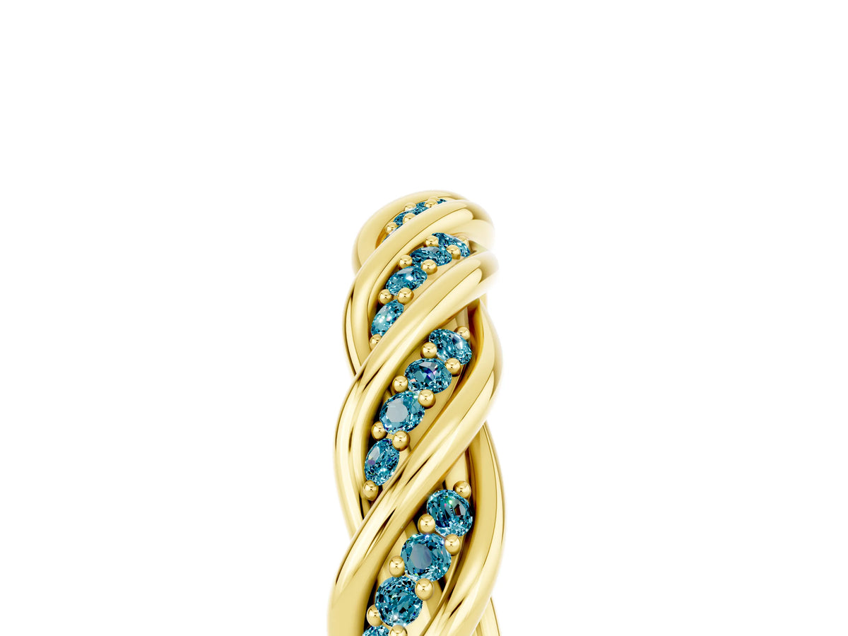 Twisted Pavé Round Blue Topaz Eternity Band in Yellow gold with Shared Prong Setting