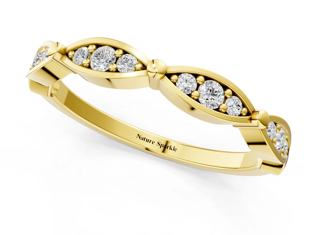 Yellow gold Marquise Diamond Pavé Eternity Band with Bezel Setting