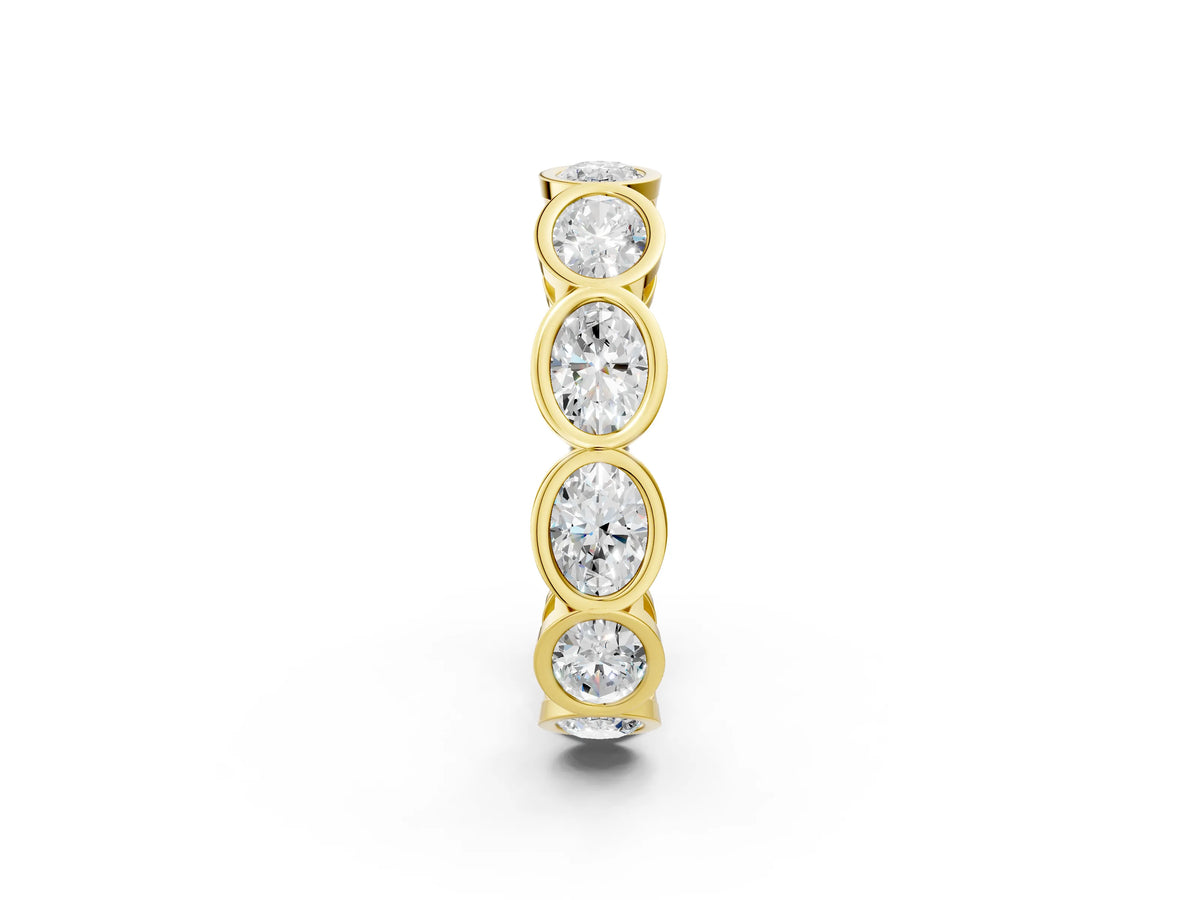 Yellow gold Oval Diamond Bezel Set Eternity Wedding Band